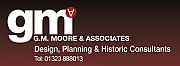 G M Moore & Associates logo